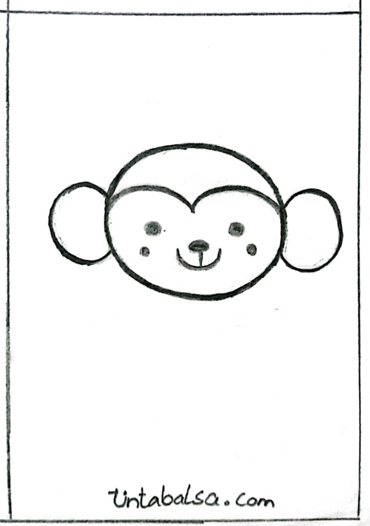 Drawing big, rounded ears for a monkey, adding a cartoonish touch."